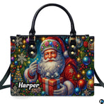 Front view of top-handle handbag featuring ornate vintage Santa holding a gift box among ornaments.