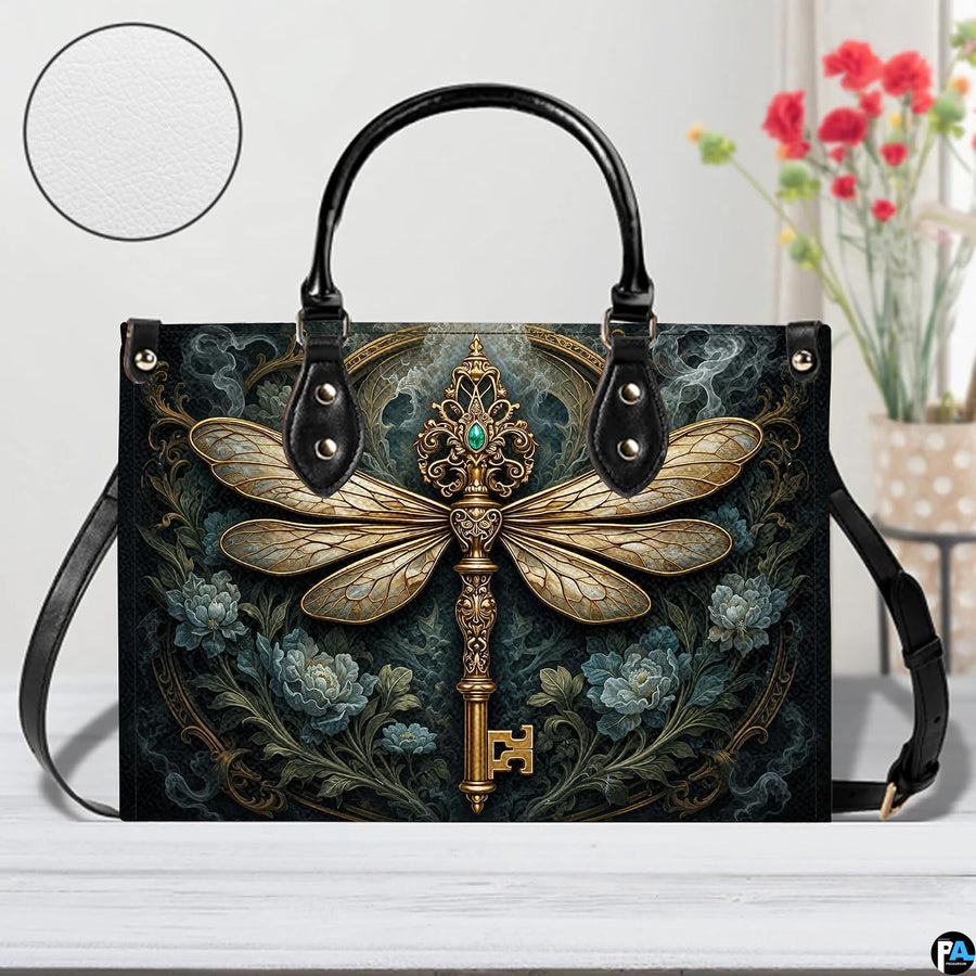 Lifestyle presentation of dragonfly key handbag and wallet set with styling accessories