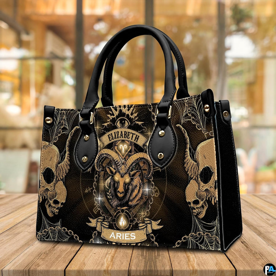 Angled perspective view of Gothic Ram Zodiac Handbag placed on a wooden deck table.