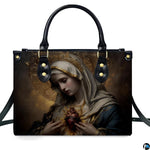 Front view of Immaculate Heart of Mary handbag showing Virgin Mary holding flaming crowned heart