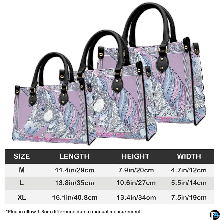 Coordinated crowned unicorn handbag and matching wallet set on white surface