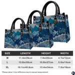 Coordinated arrangement of sea turtle handbag and wallet highlighting the unified marine artwork.