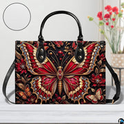 Matching crimson jeweled butterfly wallet detailing red butterfly and ruby blossoms
