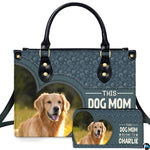 Front view of golden retriever handbag and matching wallet featuring heart photo frame and paw print pattern.