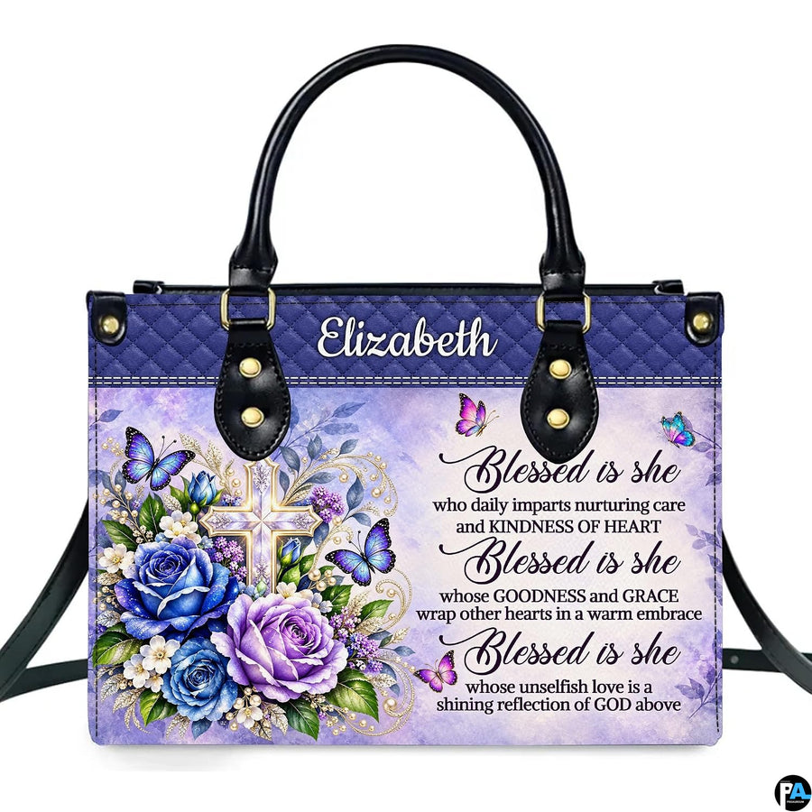 Christian cross butterfly floral handbag displayed alone on white background.