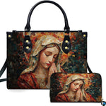 Handbag and matching wallet featuring terracotta mosaic Praying Virgin Mary artwork with radiant halo.