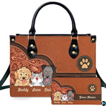 Front view of western pet trio floral handbag and matching wallet set with cartoon dogs and cat