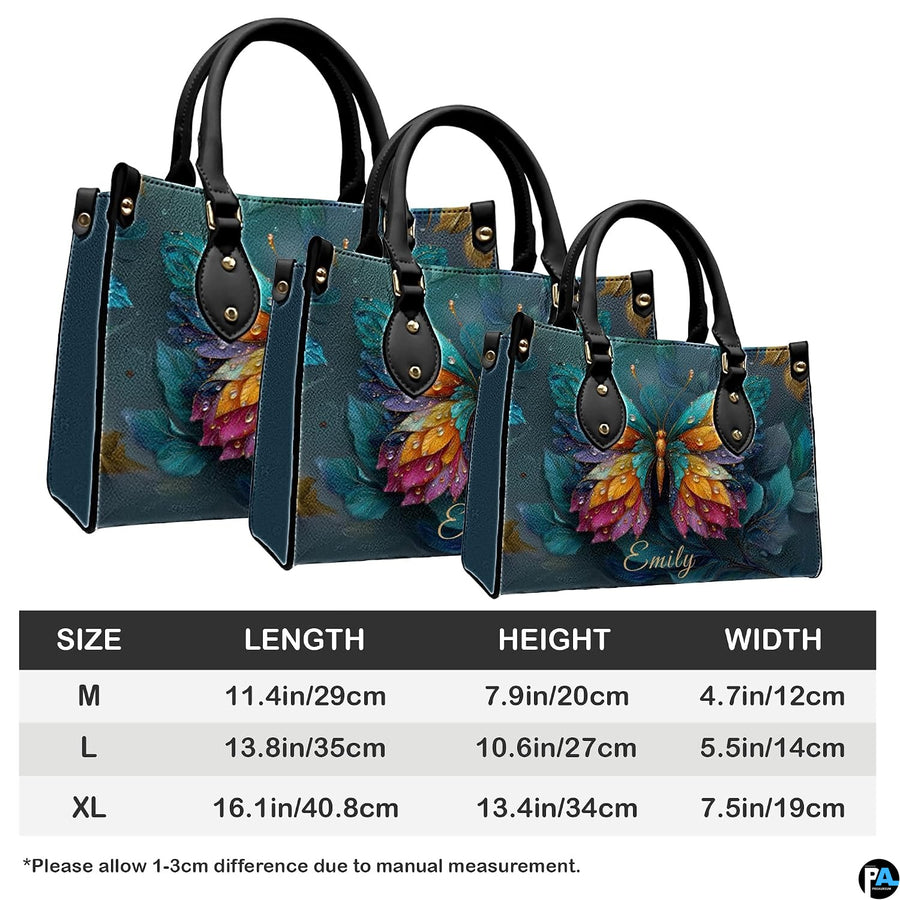 Three quarter view of structured butterfly handbag and matching companion piece