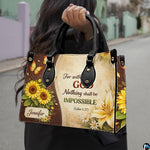 Person holding sunflower botanical design accessory outdoors along blurred street backdrop.