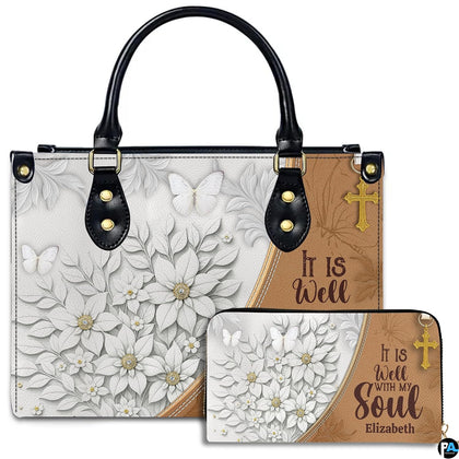 Sculpted white floral hymn handbag and matching wallet set with botanical relief on white.