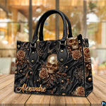 Golden skull handbag displayed on wooden plank table before indoor window.
