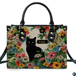 Detailed view of matching black cat wildflower zippered wallet