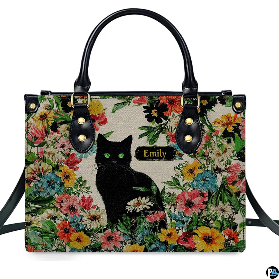 Detailed view of matching black cat wildflower zippered wallet