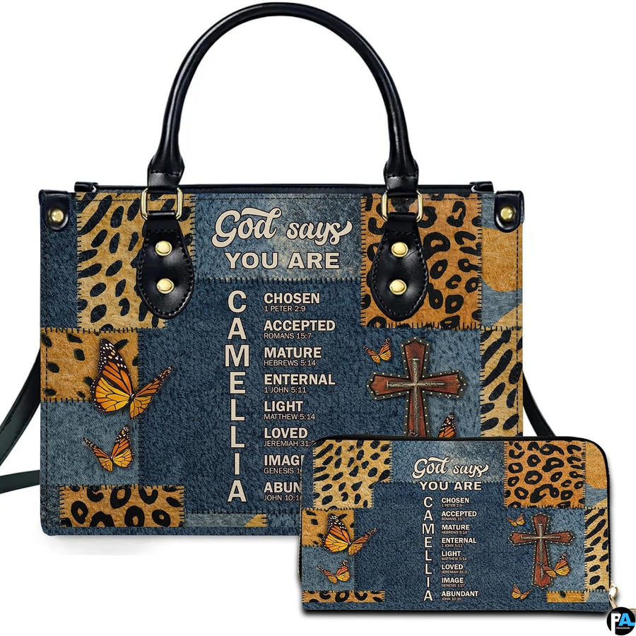 Front view of Christian cross leopard butterfly handbag and matching zip wallet on solid white background