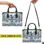 Matching elongated accessory decorated with blue knit snowman family and snowy winter graphics.