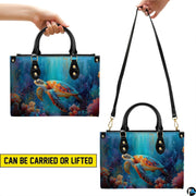 Matching wallet displaying the sunlit sea turtle gliding through tropical ocean waters.