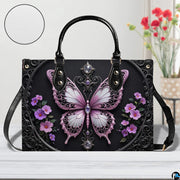 Interior view of gothic butterfly handbag showing open storage compartment with fabric lining