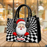 Perspective view of optical illusion Santa handbag resting on a wooden tabletop.