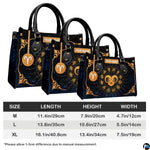 Golden celestial zodiac ram handbag paired with matching wallet against cosmic starry sky.