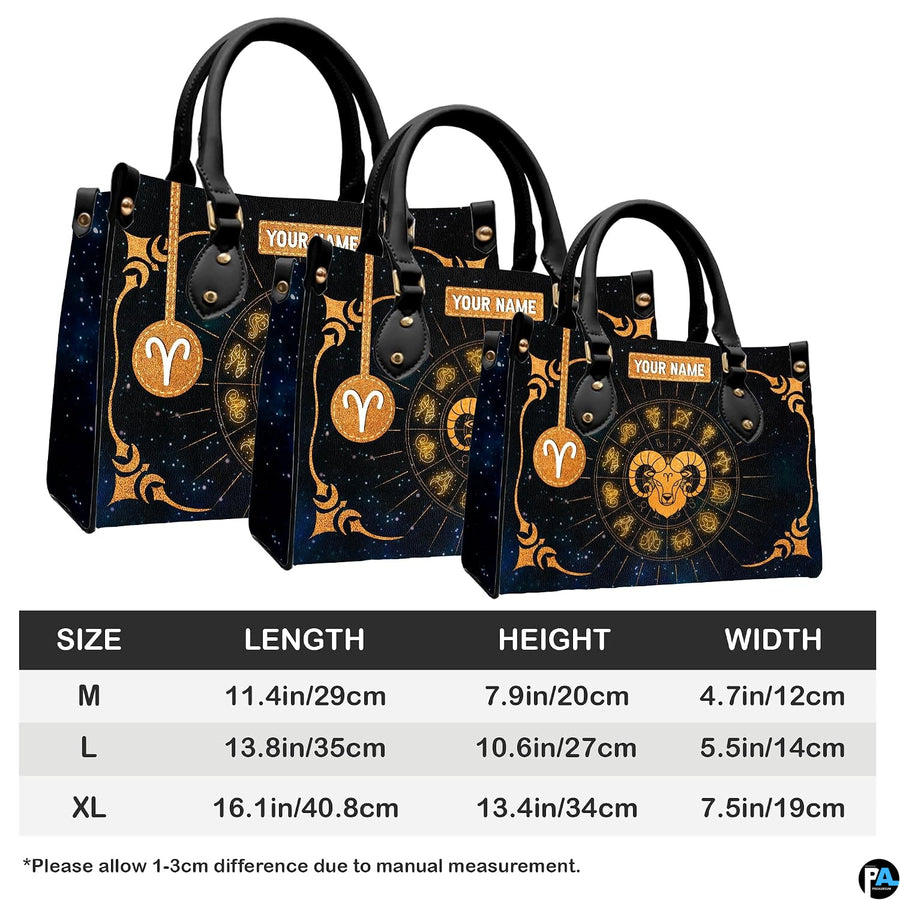 Golden celestial zodiac ram handbag paired with matching wallet against cosmic starry sky.