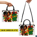 Afrocentric portrait handbag shown with top handles and long strap