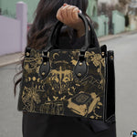 Golden dragon moon phases handbag carried outdoors along residential street.