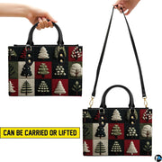 Visual presentation demonstrating dual handle orientations of the evergreen tree patchwork item