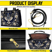 Top view of Marian crest handbag displaying top zipper opening and carry handles