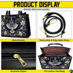 Top view of Marian crest handbag displaying top zipper opening and carry handles
