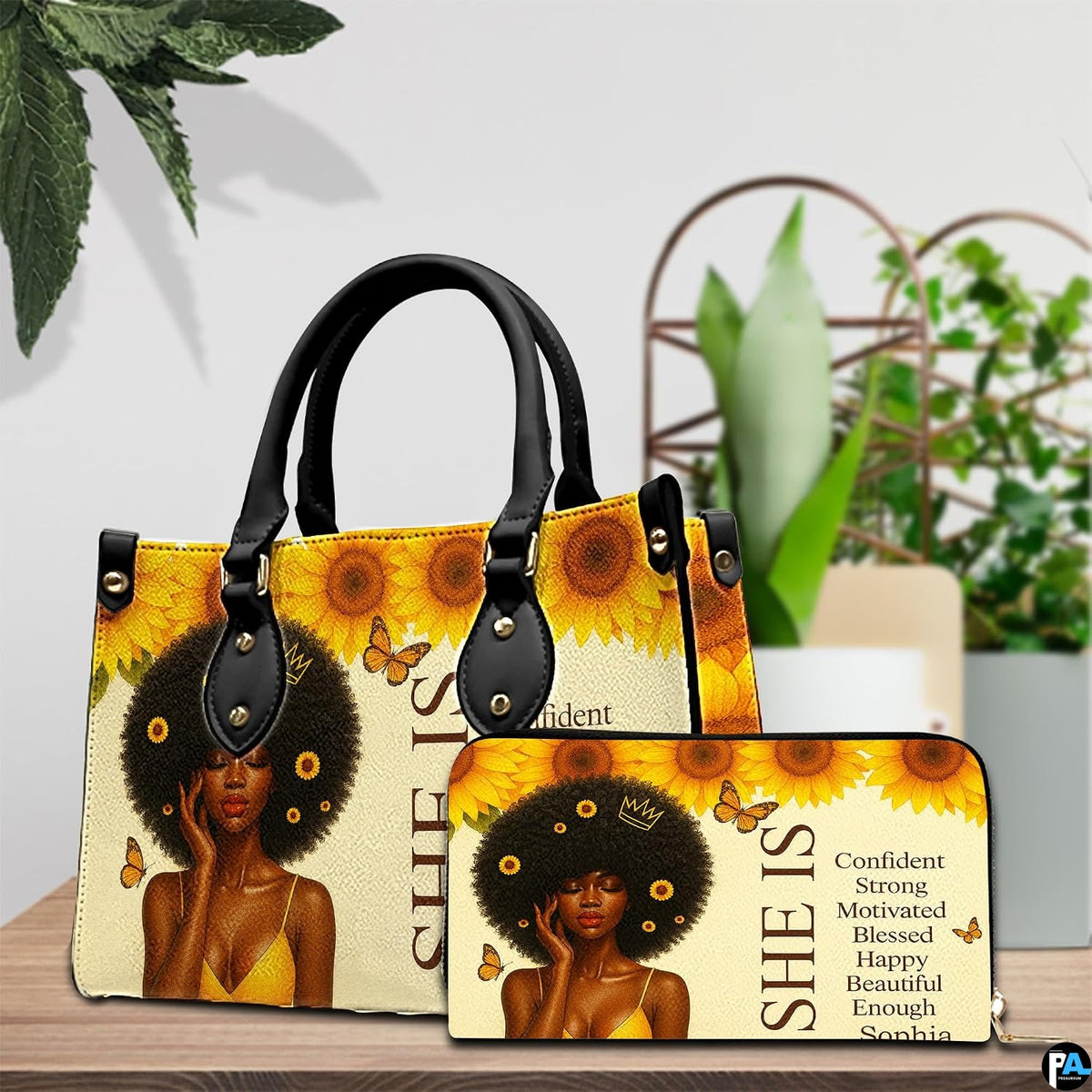 Tabletop styling showing the sunflower crown afro art accessory paired with matching companion item.