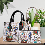 Top-down view of the handbag highlighting clean upper lines and dual carrying handles.
