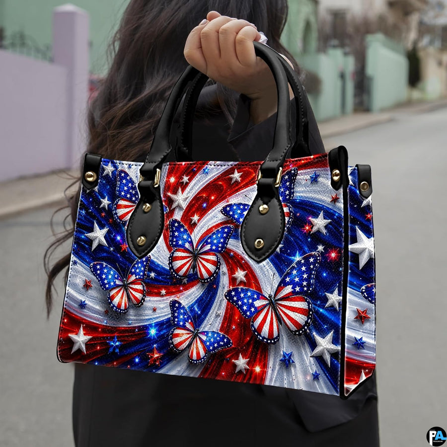 Outdoor lifestyle view of patriotic flag butterfly handbag