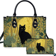 Studio presentation of black cat in forest art alongside matching rectangular companion accessory.