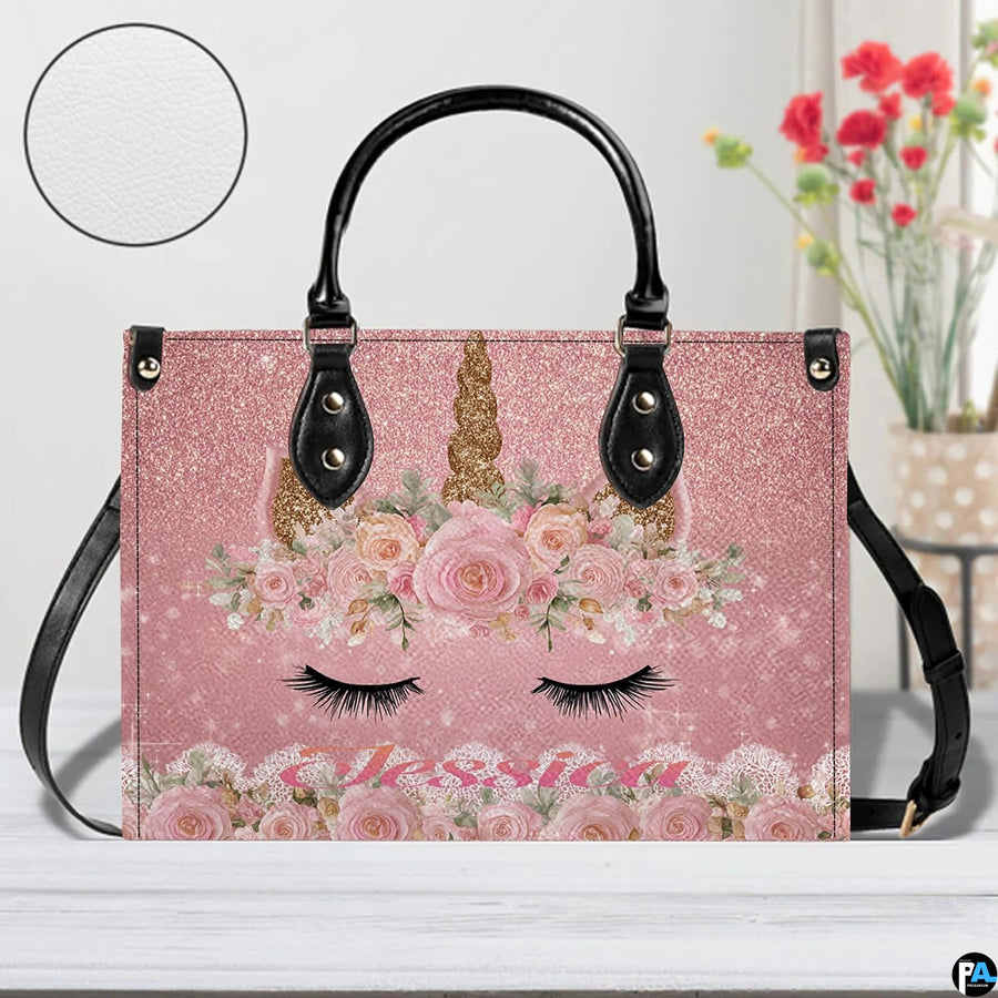 Interior compartment view of unicorn handbag showing inner lining and organization.