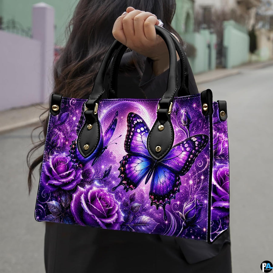 Outdoor lifestyle view of purple butterfly handbag carried by model