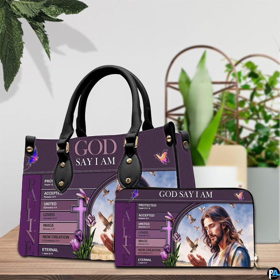 Christian Jesus handbag and wallet displayed on wooden table beside potted plant.