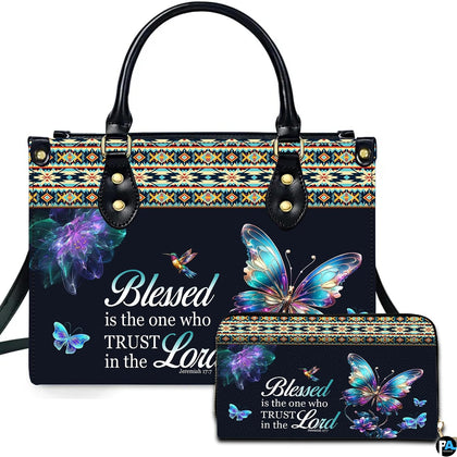 Front view of southwestern butterfly handbag and matching wallet with colorful tribal border and hummingbird.