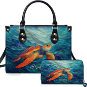 Mosaic orange sea turtle handbag and matching wallet set featuring swirling ocean waves.