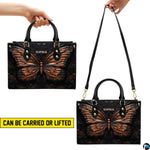 Dimension measurement chart showing medium, large, and extra-large options for the copper butterfly handbag.