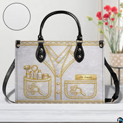 Top-down view of the handbag highlighting clean upper lines and dual carrying handles.
