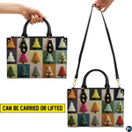 Dual lifestyle view demonstrating carrying presentation of geometric tree artwork.