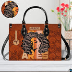 Angled perspective view of afro queen handbag highlighting retro sunset stripes and damask.