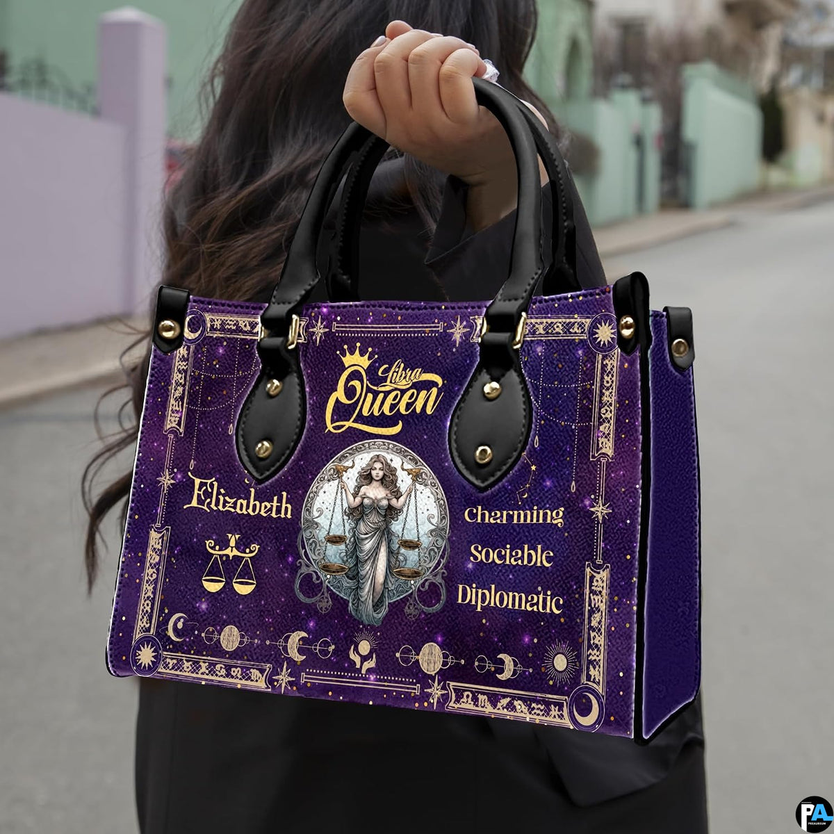 Outdoor street showcase of Celestial Scales Satchel Handbag carried on city sidewalk.