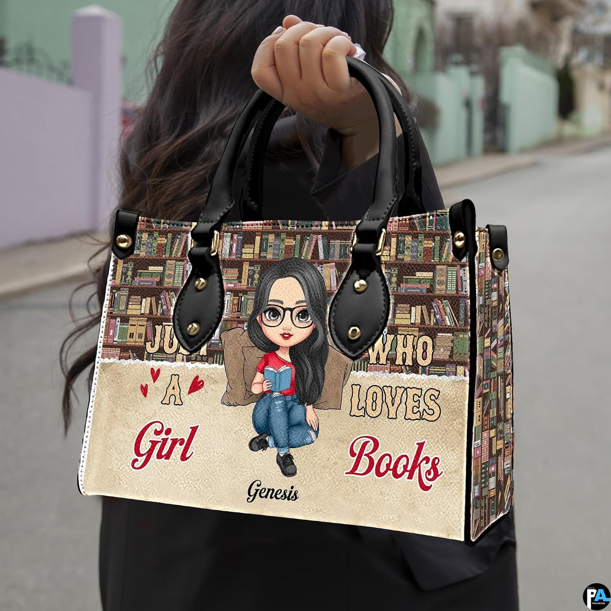 Model holding the literary bookshelf handbag outdoors showcasing the front reading illustration.