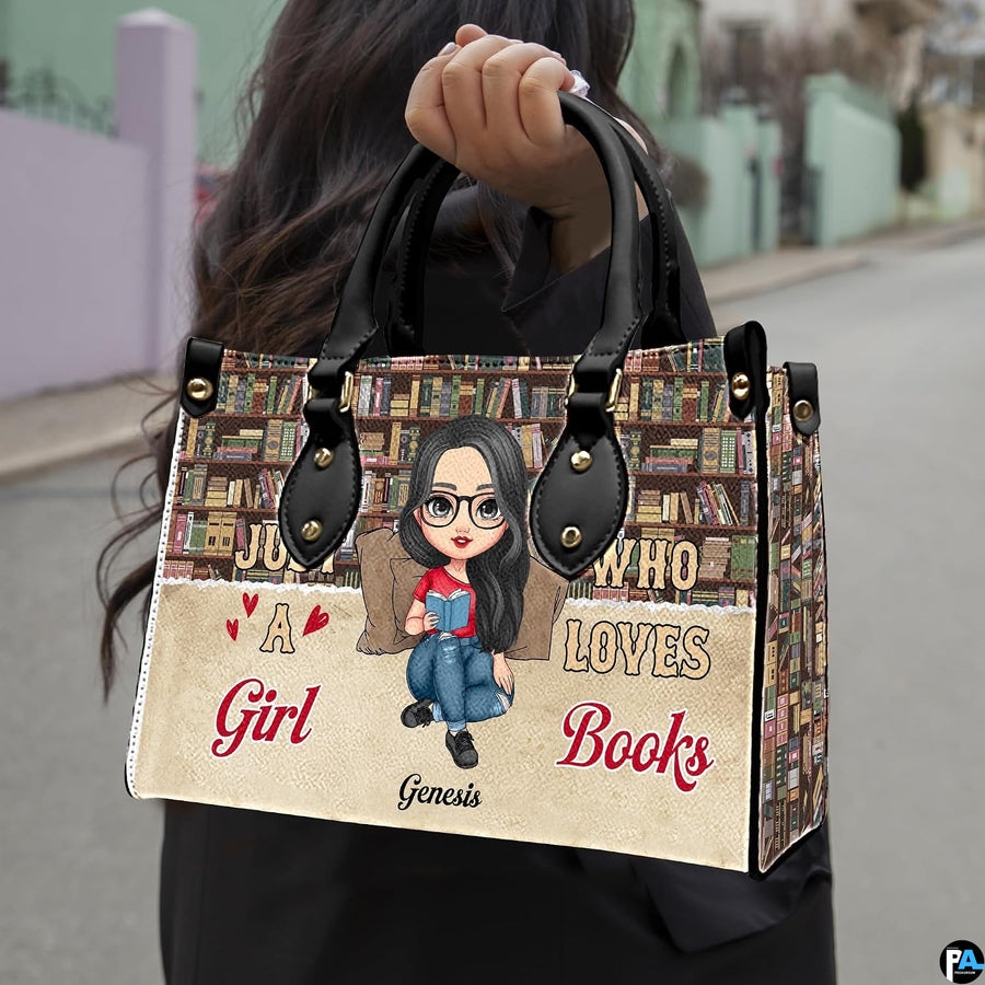 Model holding the literary bookshelf handbag outdoors showcasing the front reading illustration.
