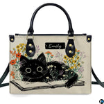 Detailed view of matching literary black kitten zippered wallet
