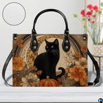 Front view of black cat pumpkin art emphasizing circular surface texture grain.