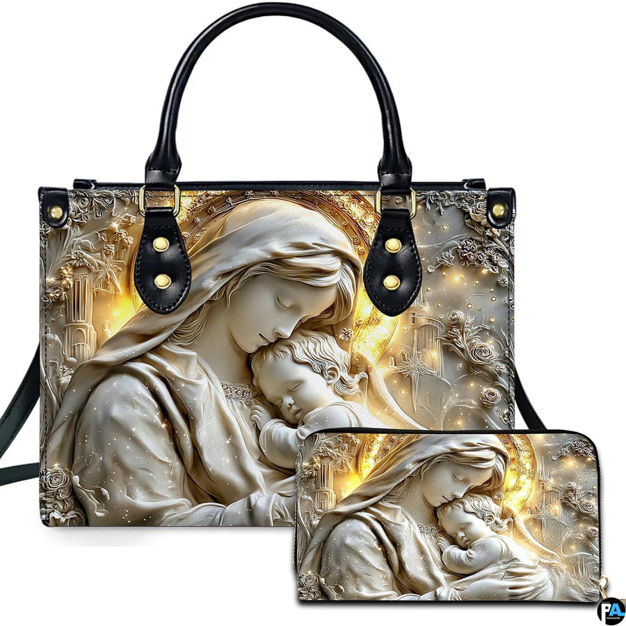 Sculpted marble relief of Madonna embracing infant Jesus with golden halo on handbag and matching wallet.