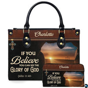 Front view of Easter resurrection sunrise handbag and matching wallet with open tomb view and three crosses.
