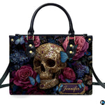 Gothic filigree skull rose handbag displayed alone on white studio background.